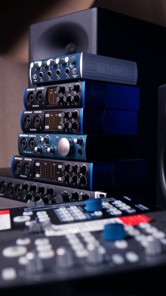 Budget Audio Interface: Stack of PreSonus audio interfaces, including Studio series models, for home studio recording.